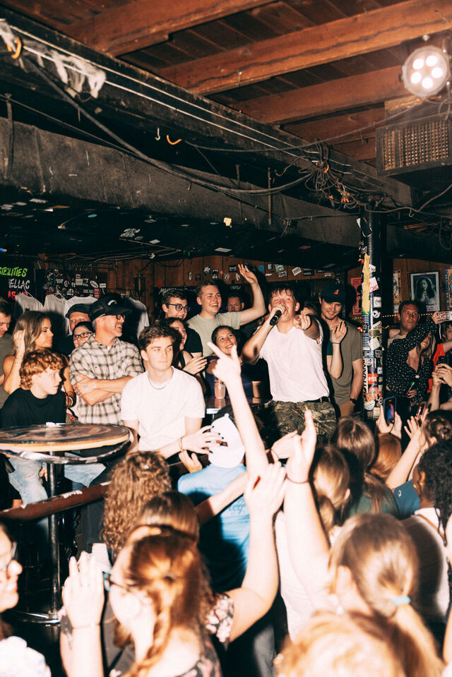 Crowd singing along at a Jude Barclay show